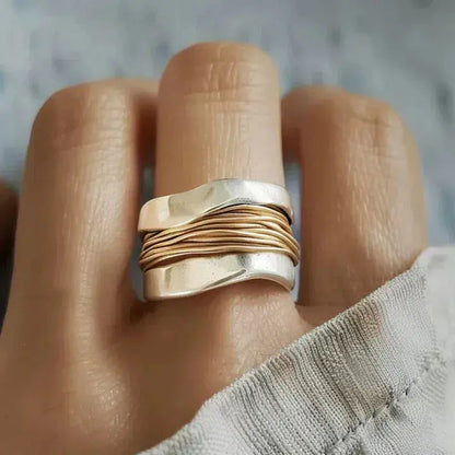 Silver ring with gold wire