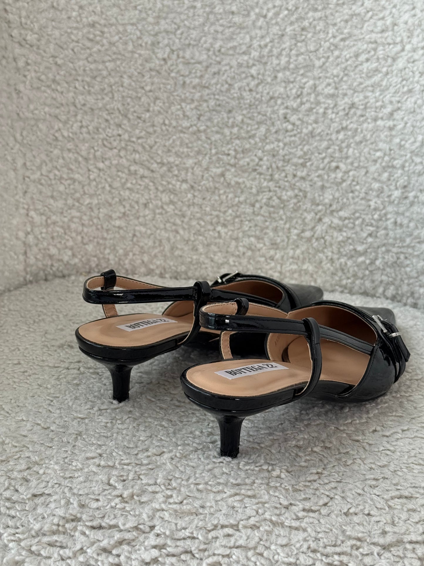 Slingback lucide nere