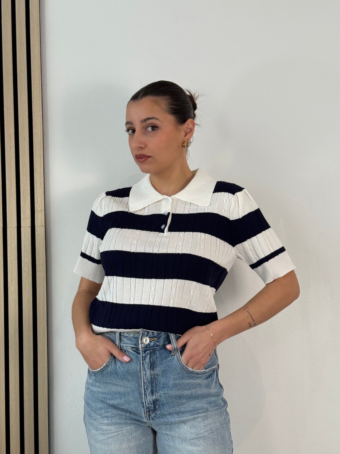 Polo in maglia a treccia