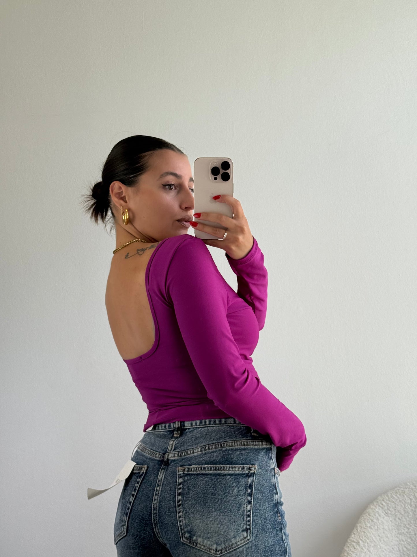 Top corto con scollo sulla schiena