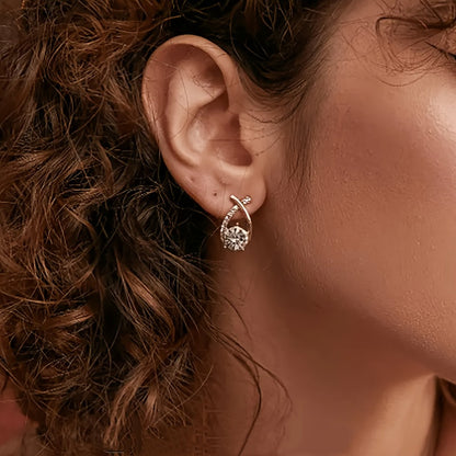 Earrings with golden cross and zircons