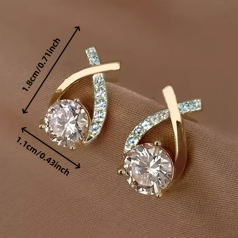 Earrings with golden cross and zircons