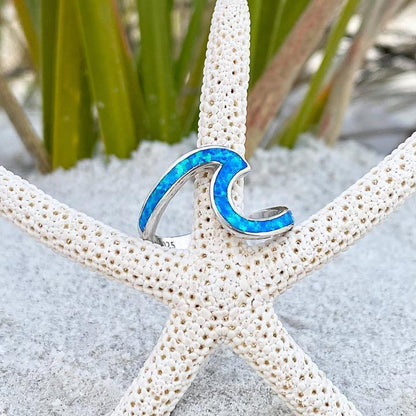Anello a Onda in Argento con Opale Blu