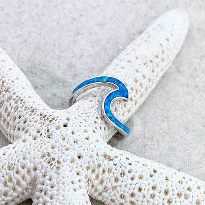 Anello a Onda in Argento con Opale Blu