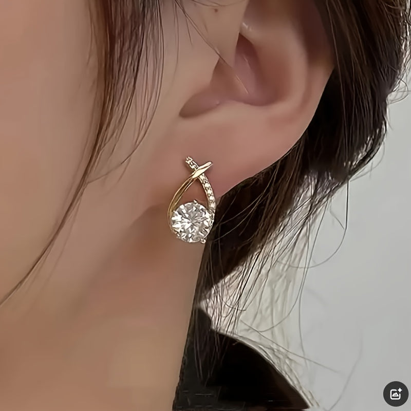 Earrings with golden cross and zircons