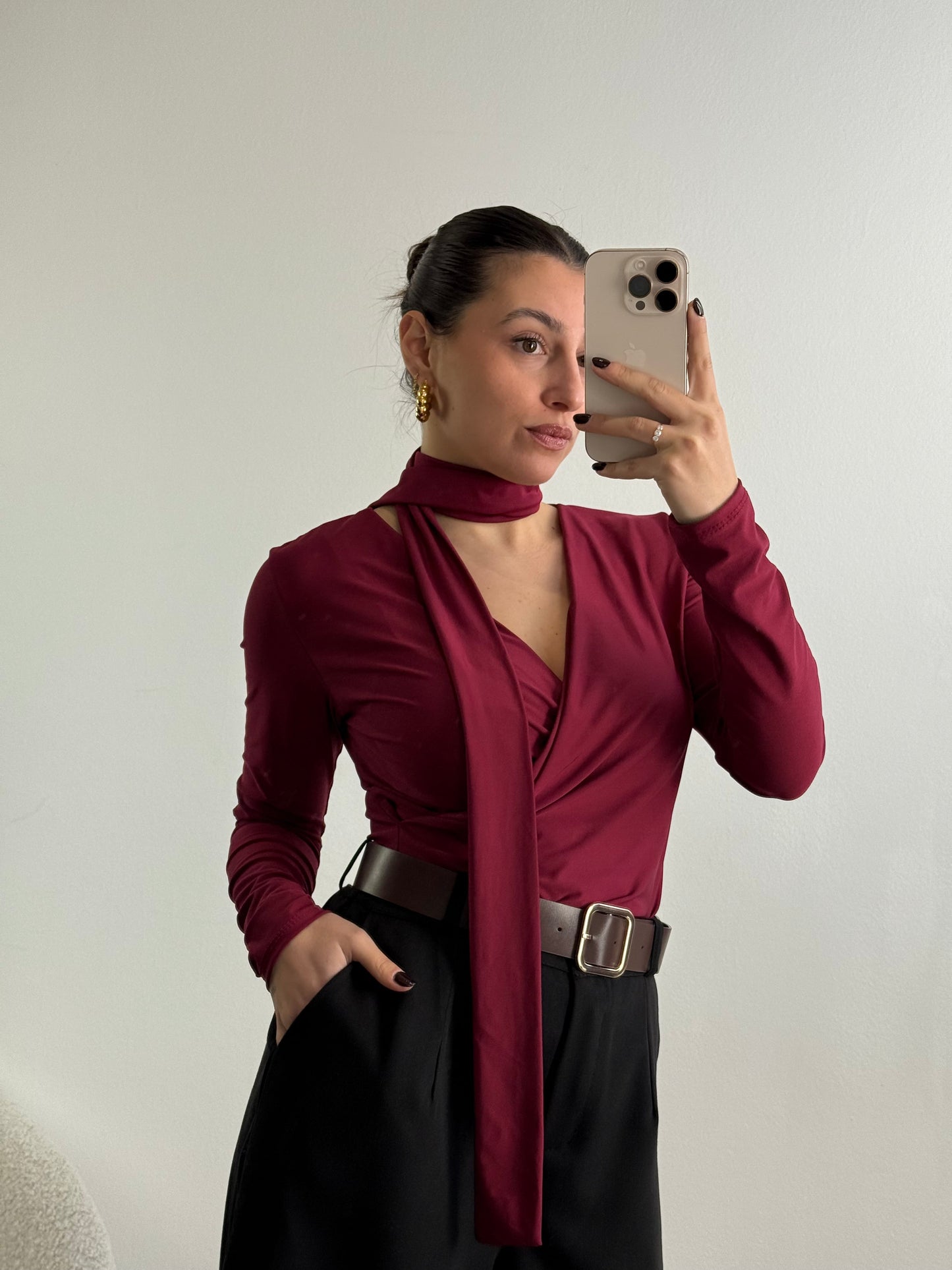 V-neck sweater with integrated scarf