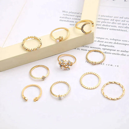 Set of 10 bohemian rings in silver and gold