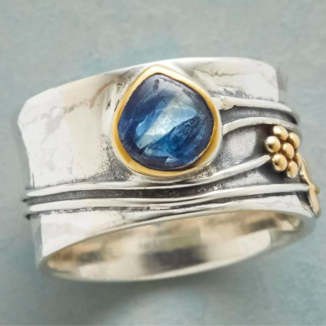Vintage silver ring with blue crystal