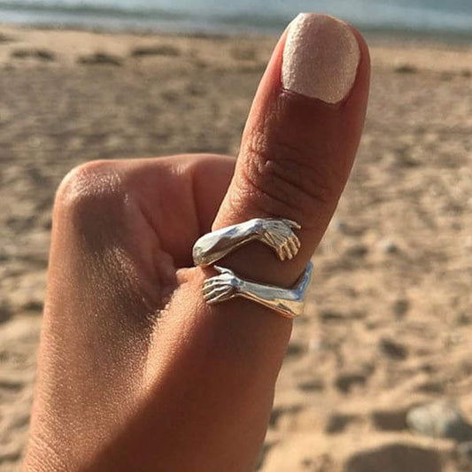 Anello dell’Abbraccio in Argento Regolabile