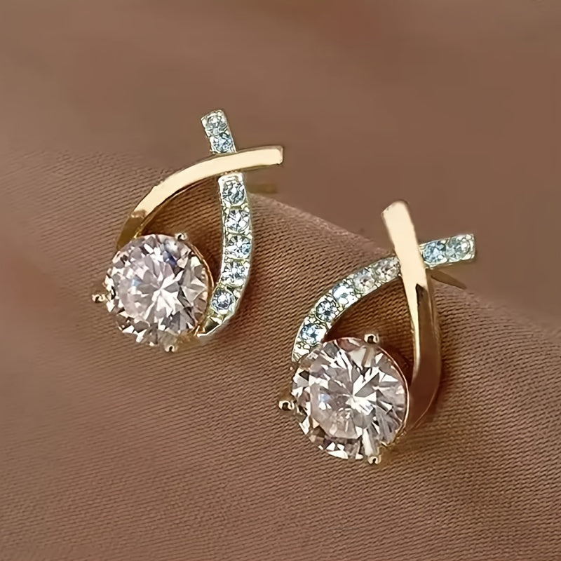 Earrings with golden cross and zircons
