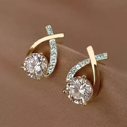 Earrings with golden cross and zircons