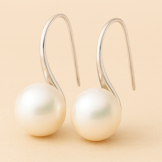Orecchini eleganti a goccia con perle