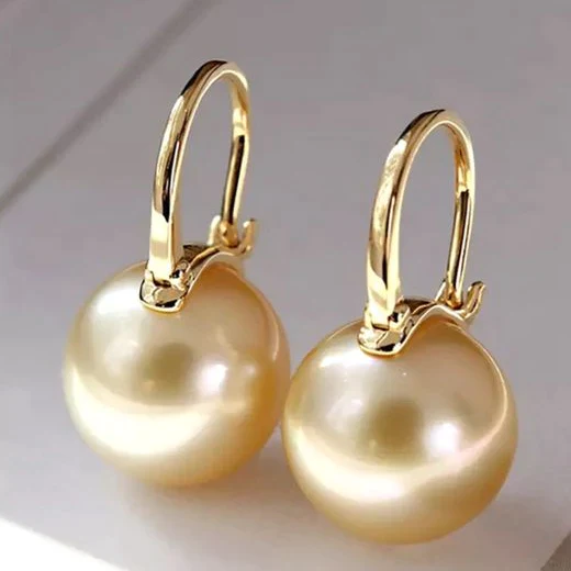 Orecchini eleganti in oro con perle