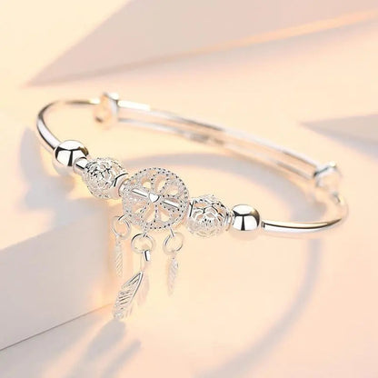 Silver bracelet with dreamcatcher pendant